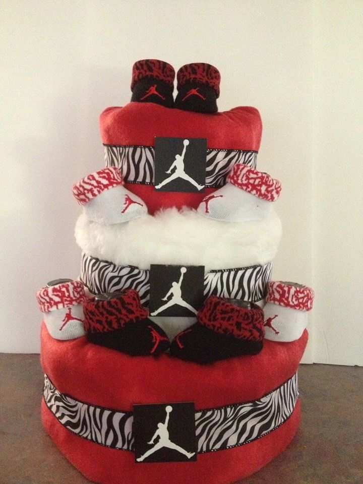 3 layer Jordan diaper cake with 4 pair of Jordan booties. Many styles and colors are available