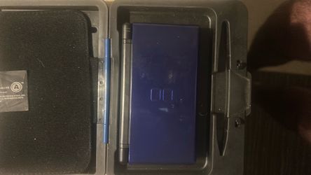 Nintendo ds lite plus 3 games and case. No charger
