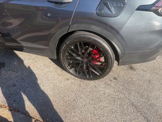 Black Multi-Spoke Aftermarket Wheel with Hankook Tire/Rims