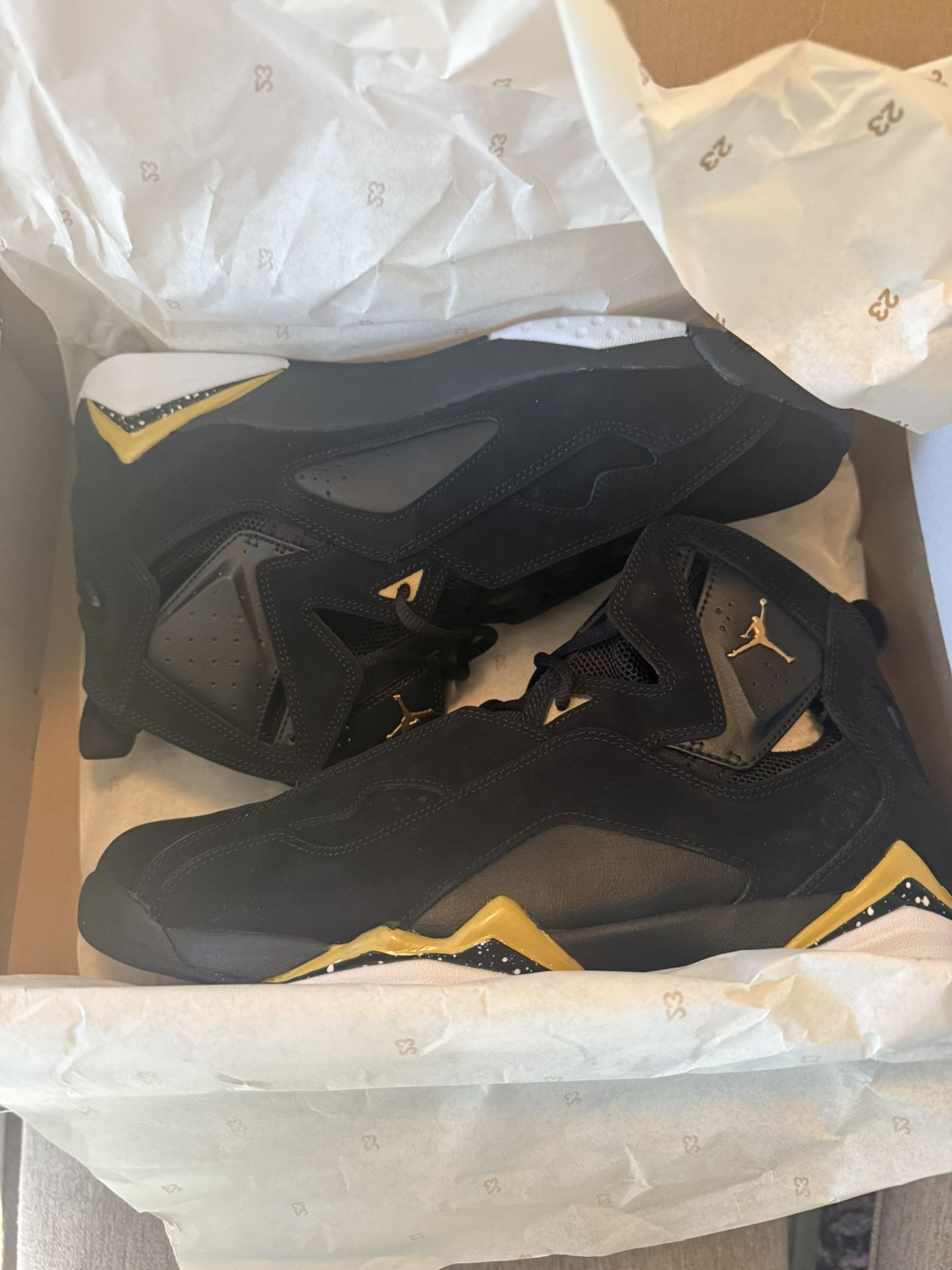 Black And Gold Jordan 7s 