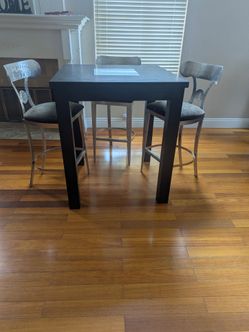 High top table with bar stools