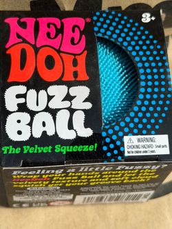 Nee Doh branded fuzz ball in vivid turquoise