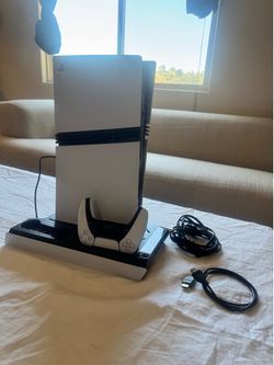 PS5 Pro, cooling/charging stand w/ headphone clip. All cables