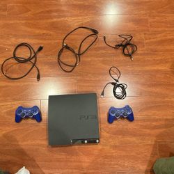 Used PS3 With 2 Controllers, 2 Charging Cables, And Connecting Cable (Great Condition)