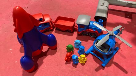 Green toys: helicopter, train and rocket
