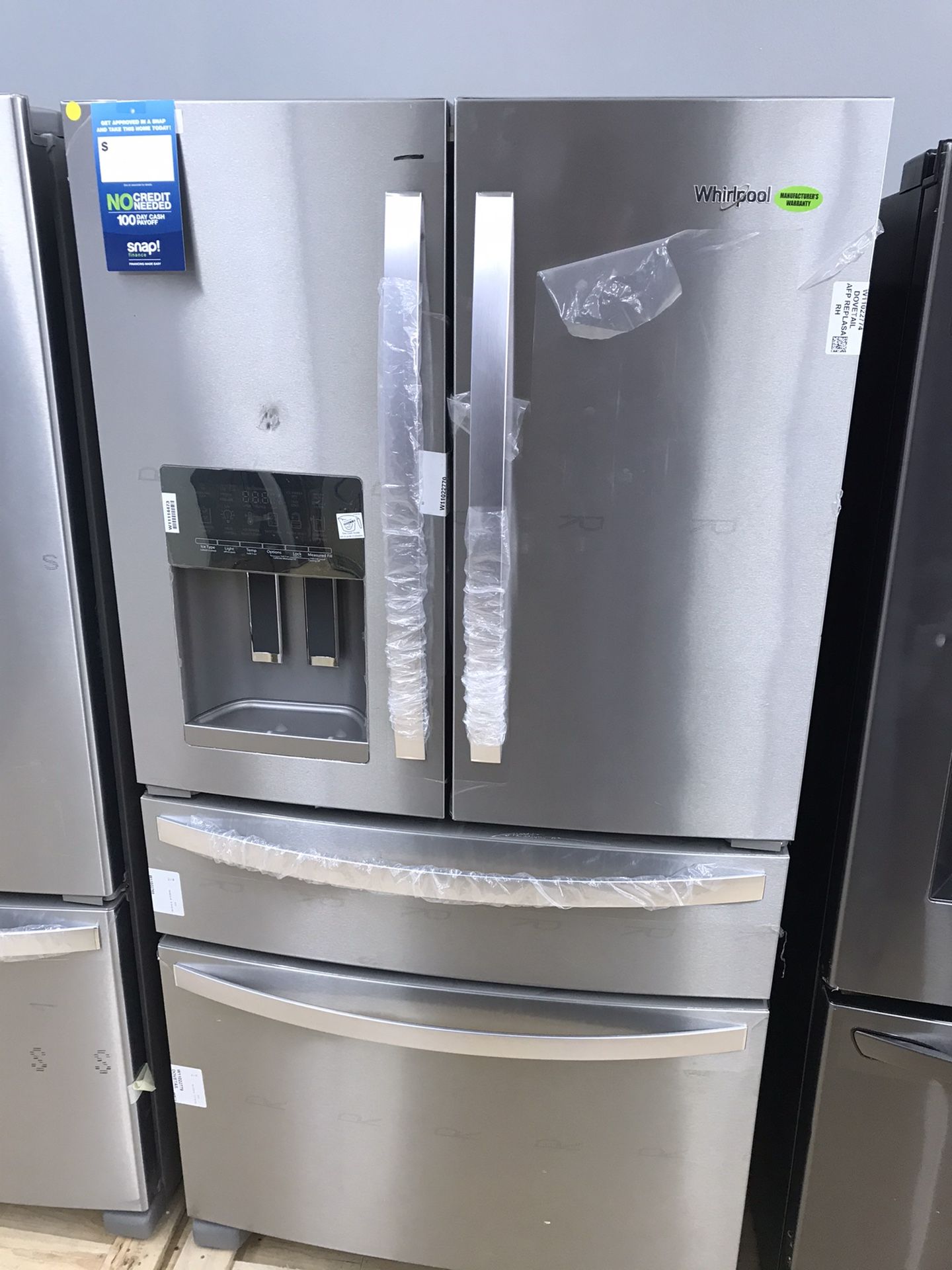 Brand new Whirlpool stainless steel refrigerator