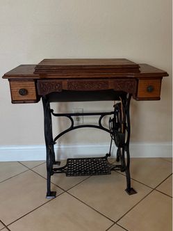 Vintage Sewing Machine with Beautiful Wooden Cabinet