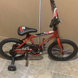 Like new!! Huffy 16” bike with training wheels