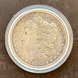 1892-O Morgan Silver Dollar In Plastic Case