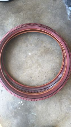 Used 2 pair red BMW cruiser tires outdoor beach park