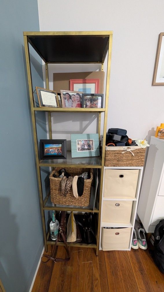 Gold-tone frame with glass shelves