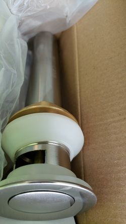 Pop up drain for sink with over flow /New open box. Never used