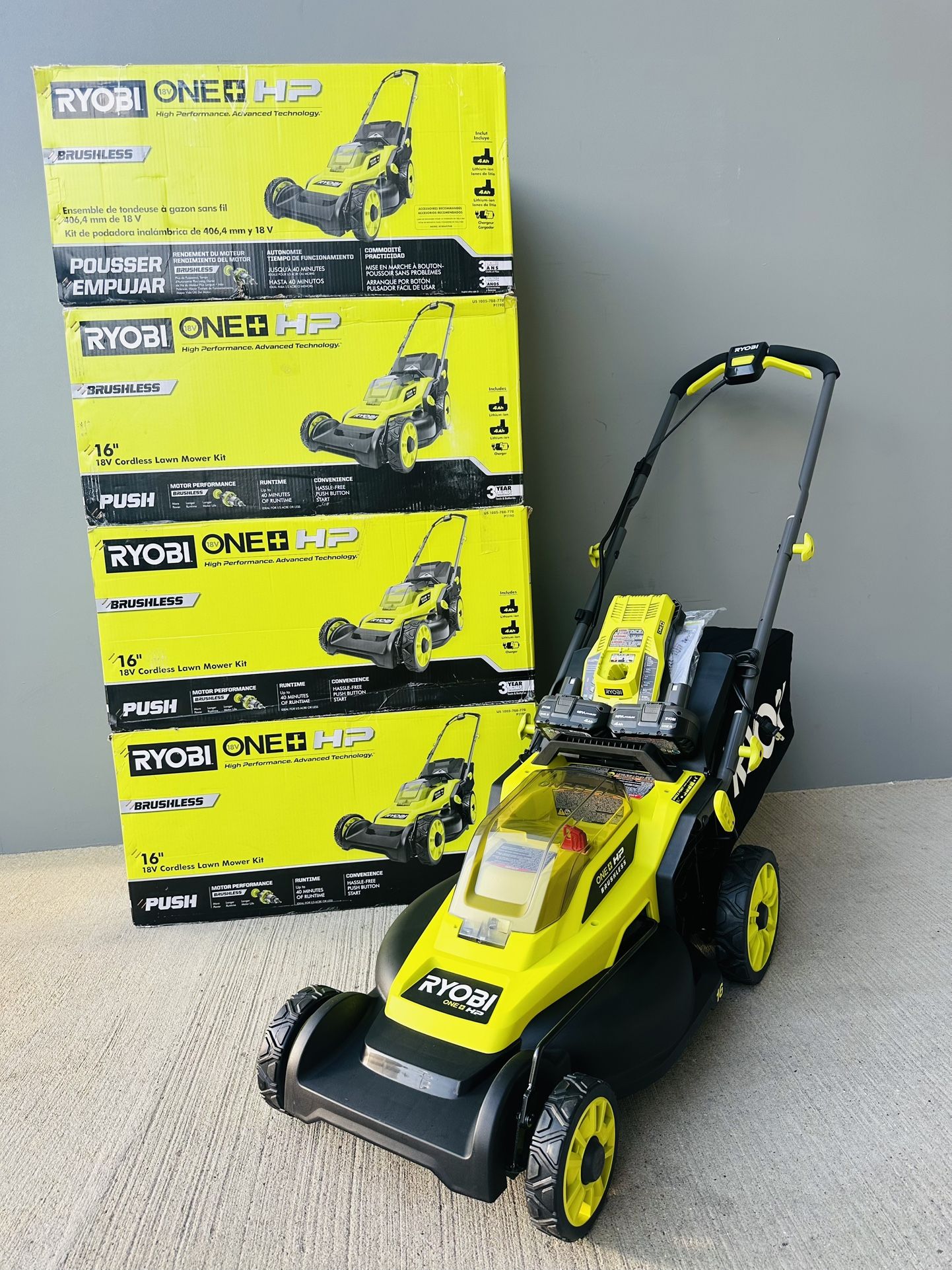 Brand new Ryobi ONE+ HP 18V Brushless 16 in. Cordless Battery Walk Behind Push Lawn Mower with (2) 4.0 Ah Batteries and (1) Charger