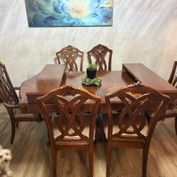 Dining room set, table and 6 chairs, display cabinet with light, all for $450.00.