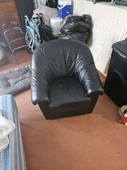 Black Leather Swivel Couch