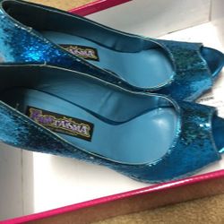 Glitter turquoise heels size 9 but I am 8.5