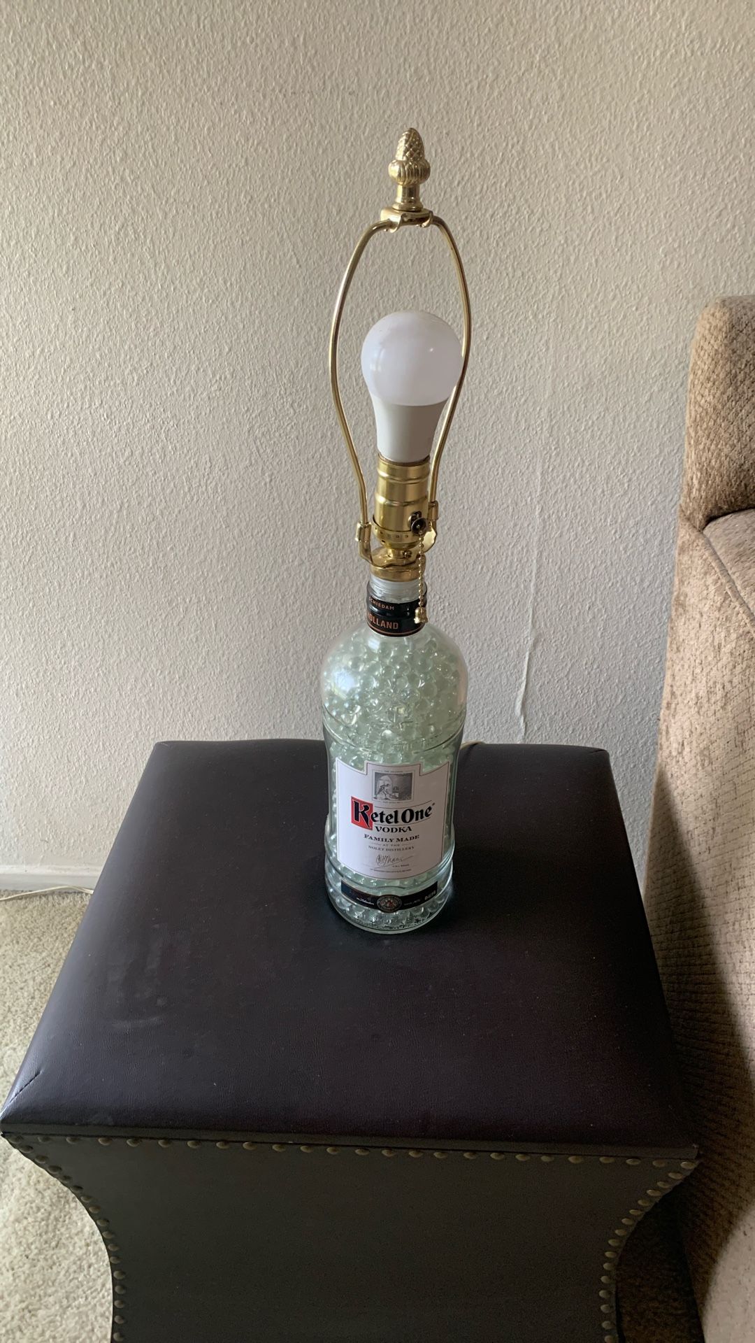 Empty Kettle One Bottle Lamp inside the bottle is filled with clear marbles very cool