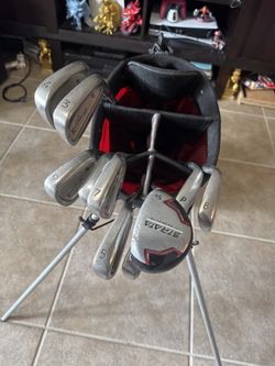 Golf Clubs And Bag And Balls