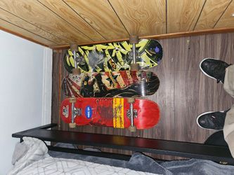 3 skate boards 