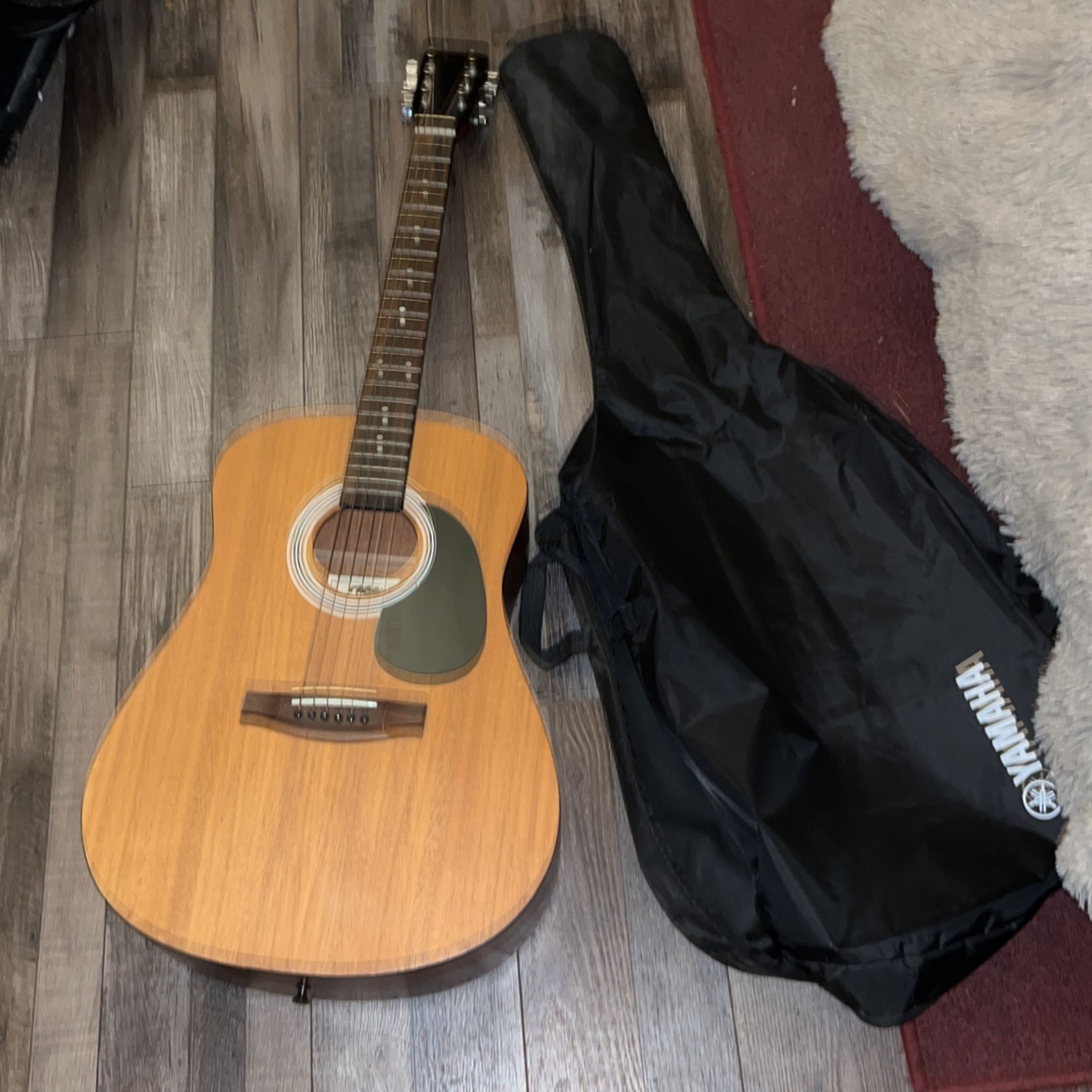 Guitar With The Yamaha Case