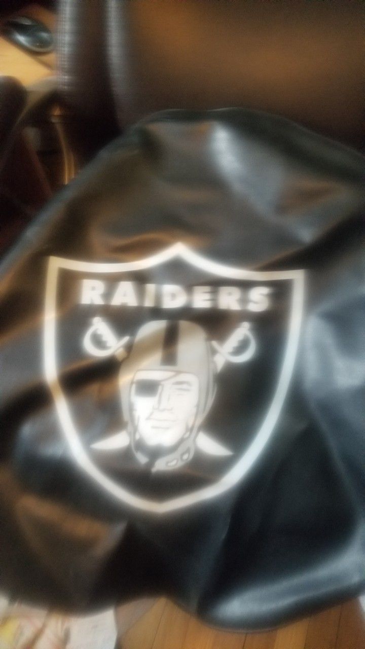 Raiders Tire Cover And Leather Jacket