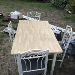 Table and 4 chairs 