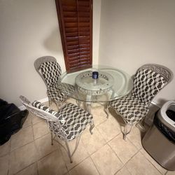 Iron/ Glass top Table 4 chairs