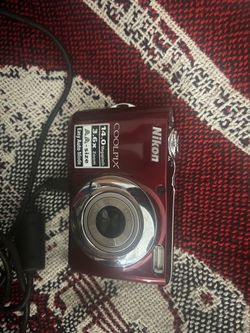 Milonga Coolpix 14.0.  3.6x Zoom AA size