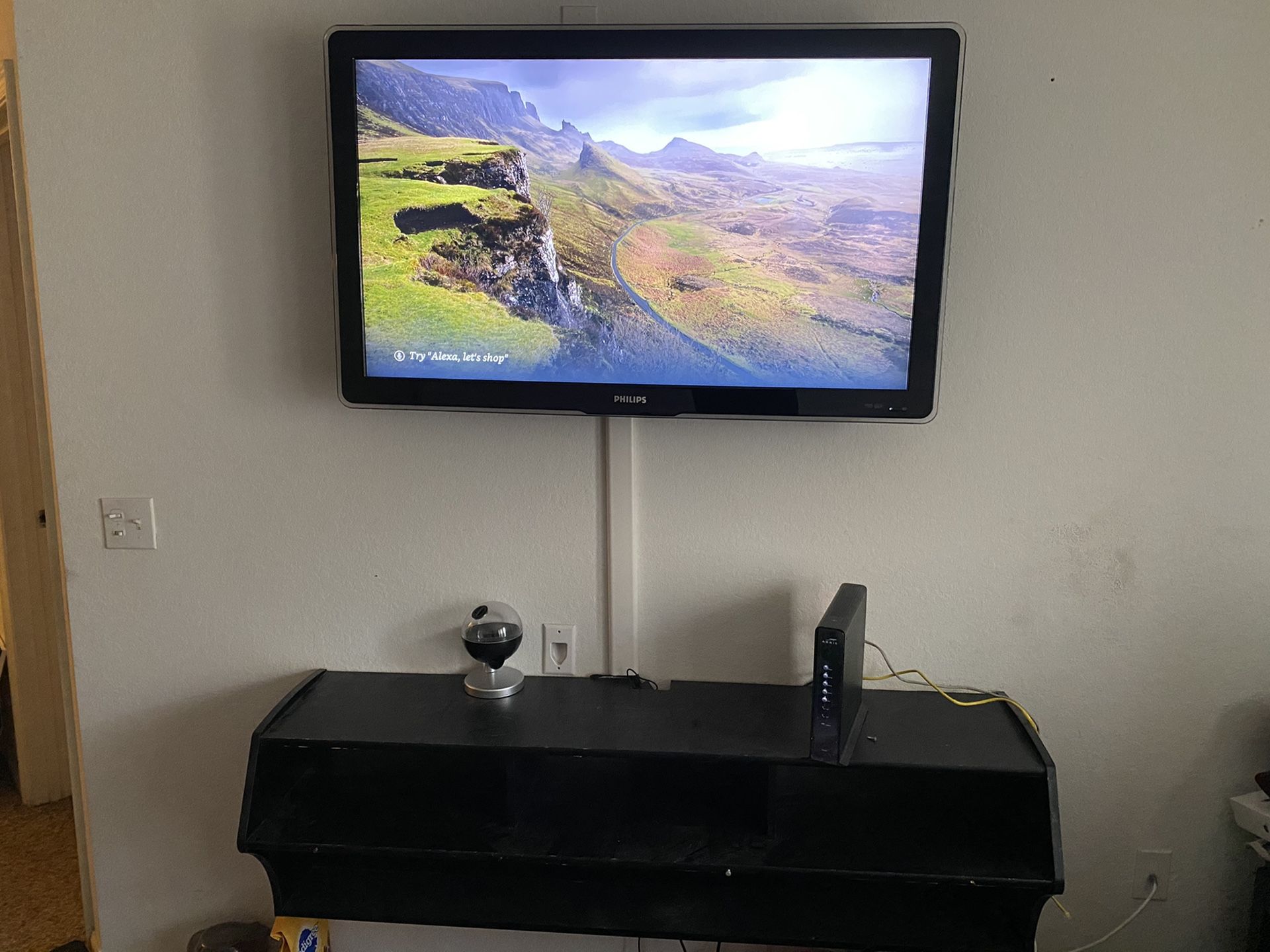 Phillips 50 inch 1080p plasma tv with floating entertainment center