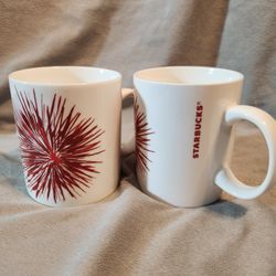 Two beautiful Starbucks 2014 12 Oz Mug Coffee Cup Red Starburst Fireworks