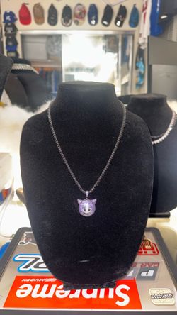 blackTenis chain with purple emoji pendant