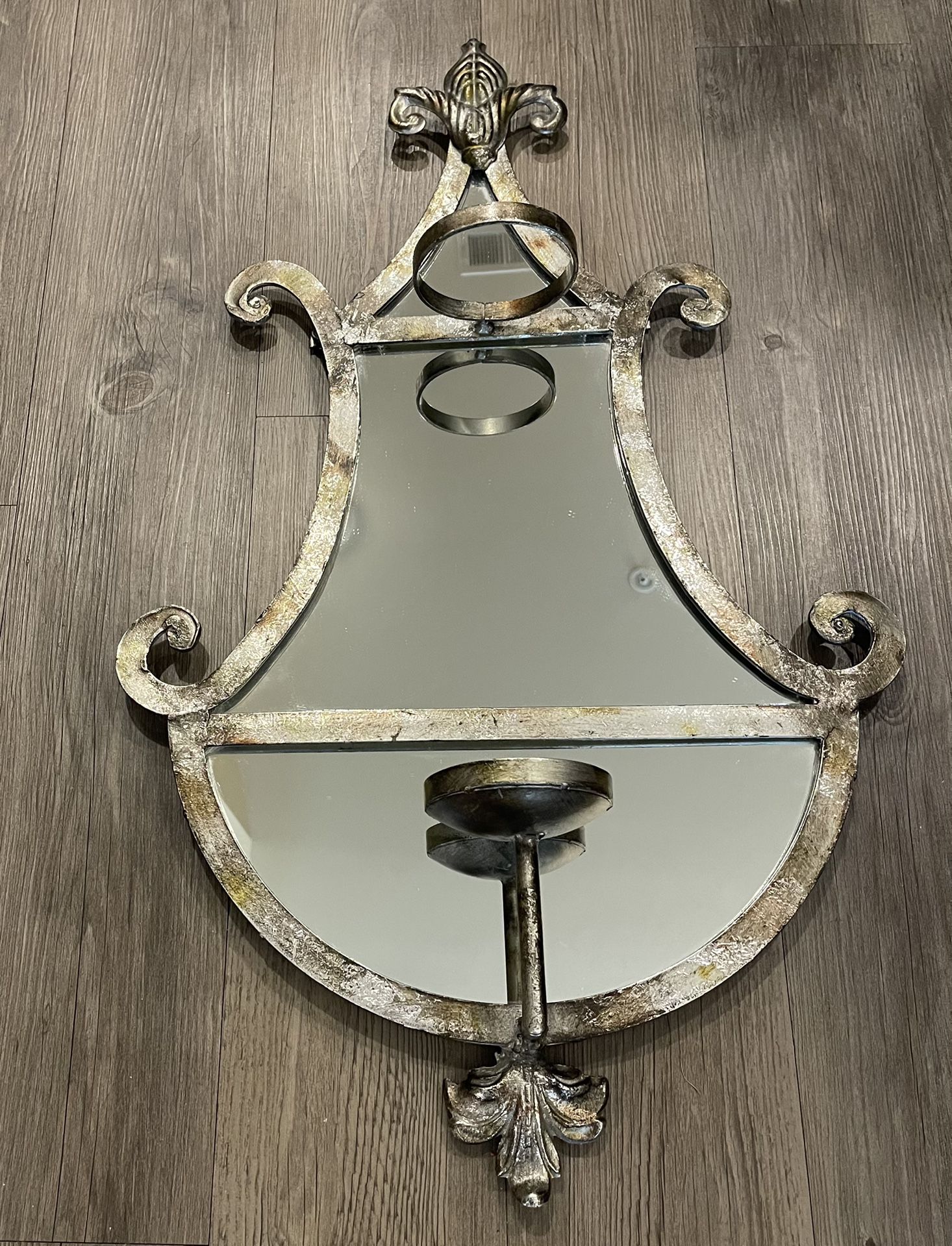 Never Used- Mirrored Wall Sconce.  Weathered Champagne Colored Wrought Iron.  Solid, weights about 8lb.  30h x 18w 