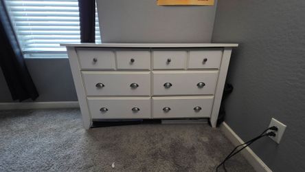 White dresser and bed frame