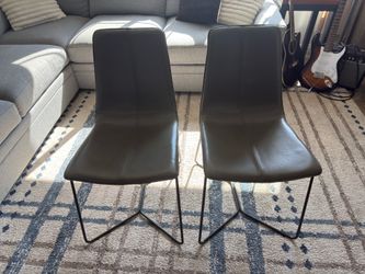 West Elm leather dinner chairs (pair)