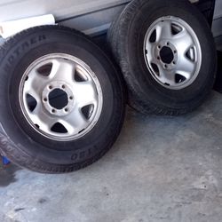 Pair of 16 inch wheels -tires