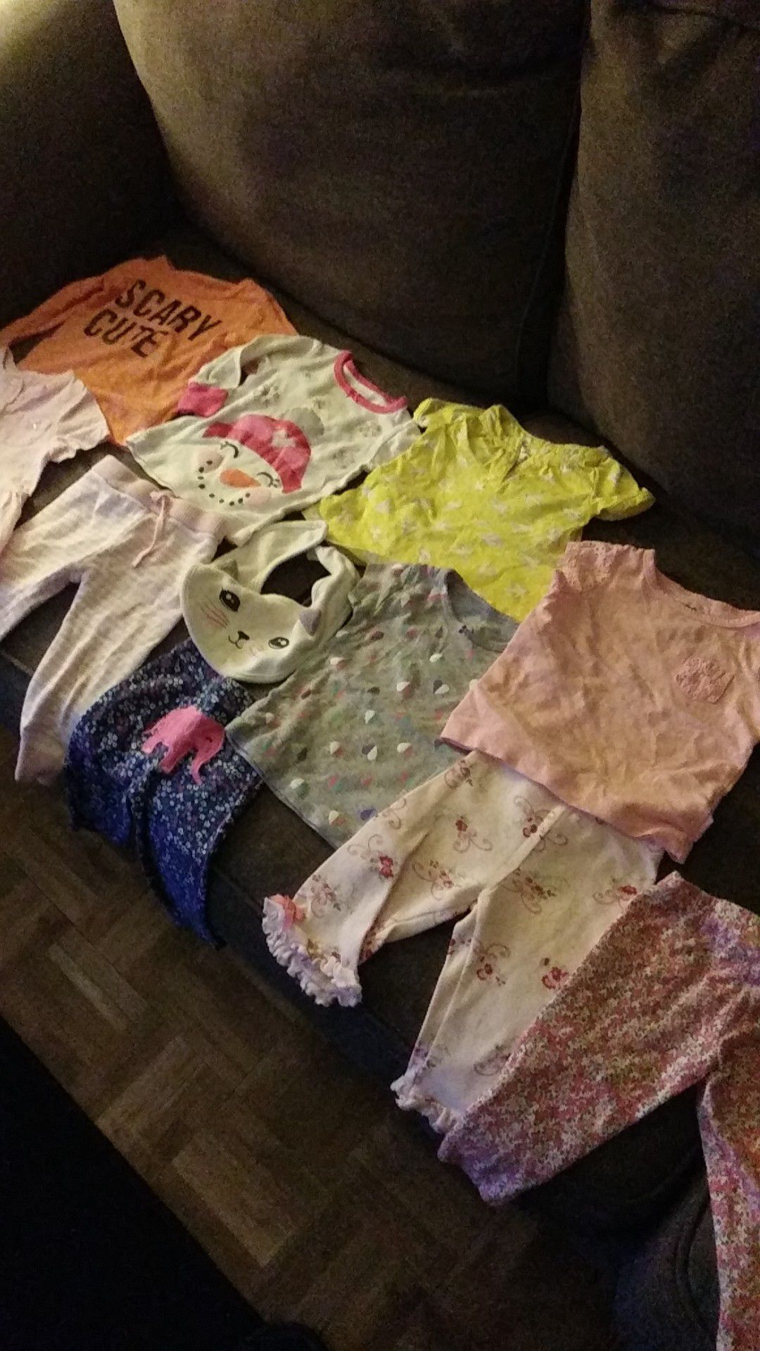 6-9 months all NO STAINS. want to trade for size 2 or 3 diapers. Great condition. 6 tops 4 bottoms 1 bib