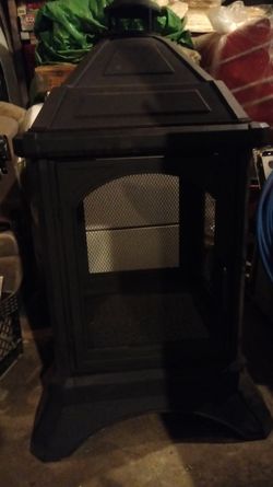 Wood Burner...50" H - 29"W- 29D