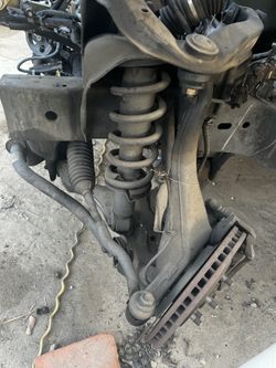 2006 Nissan Frontier Driver Spindle Control Arm rotor