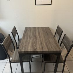 Grey And Black Table And Chairs 