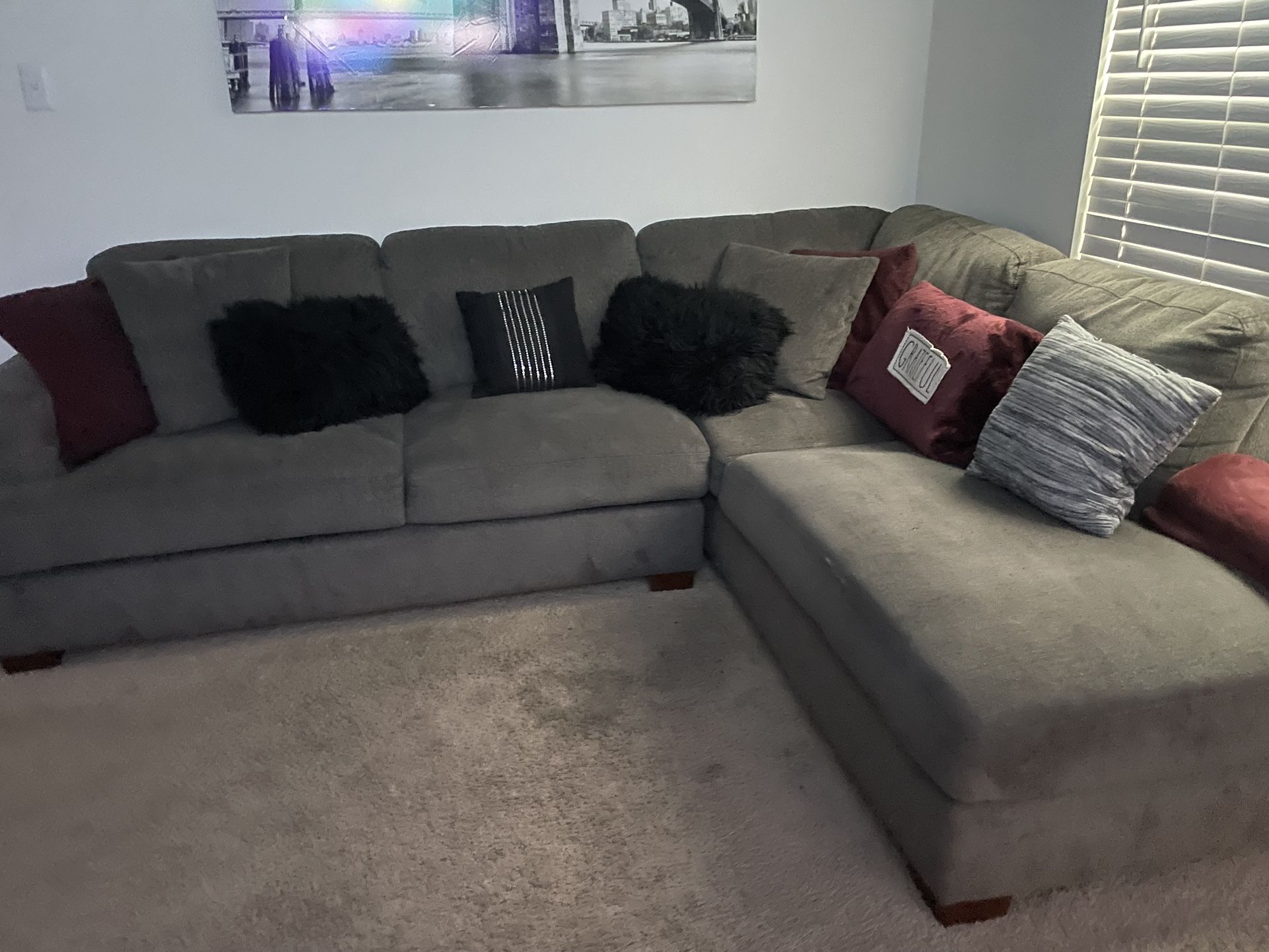 Gray Sectional With Pillows 