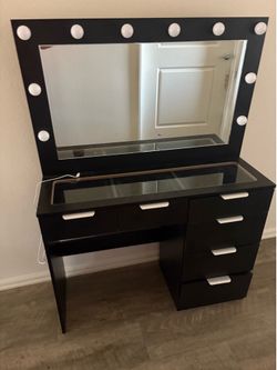 Vanity with mirror and lights