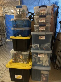 Several Storage Boxes Of Legos