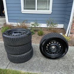 4 Mounted Studded Snow Tires 225 / 50R17