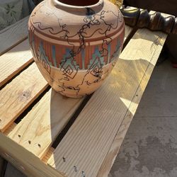 This is a Vintage Native American Pottery Handcrafted Ecco Terra Porcelain Vase Flowerpot