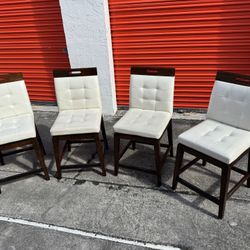 Set of four chairs in very good condition (Julian Place Vanilla Counter Height Stool)