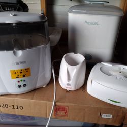 A Lot Of Baby Sanitizers Wipes And Warmers