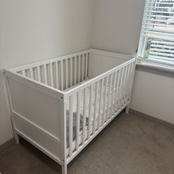 white baby bed