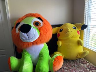 Big Stuffed Animals Lion and Pikachu 30$ for both