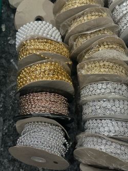Rolls of pearls and beads going for only $2.00 per roll