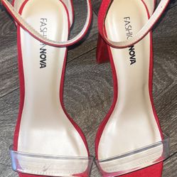 Like new woman’s size 7 1/2 red velvet heels with clear piece on front toes.  located Off lake mead and Simmons area asking $10